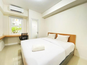 Homey and Comfy Studio Apartment at Parahyangan Residence By Travelio